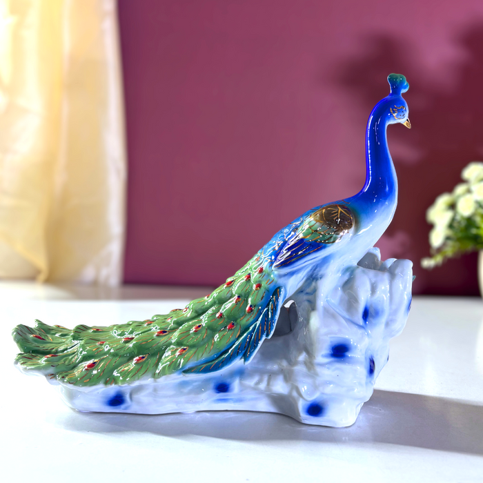 Celestial Blue Ceramic Peacock Sculpture – Premium Art Décor by The Decor Paradise