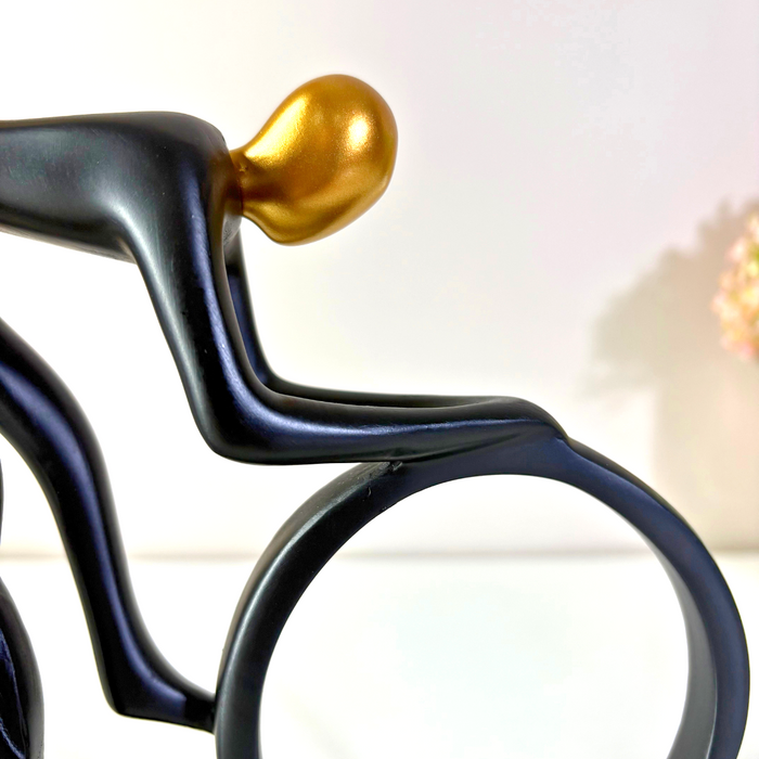 Premium Black Gold Cyclist Figurine - Dynamic Sports Showpiece by The Decor Paradise