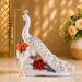 White peacock decor statue on decorative base
