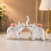 White Ceramic Elephant with Raised Trunk Showpiece