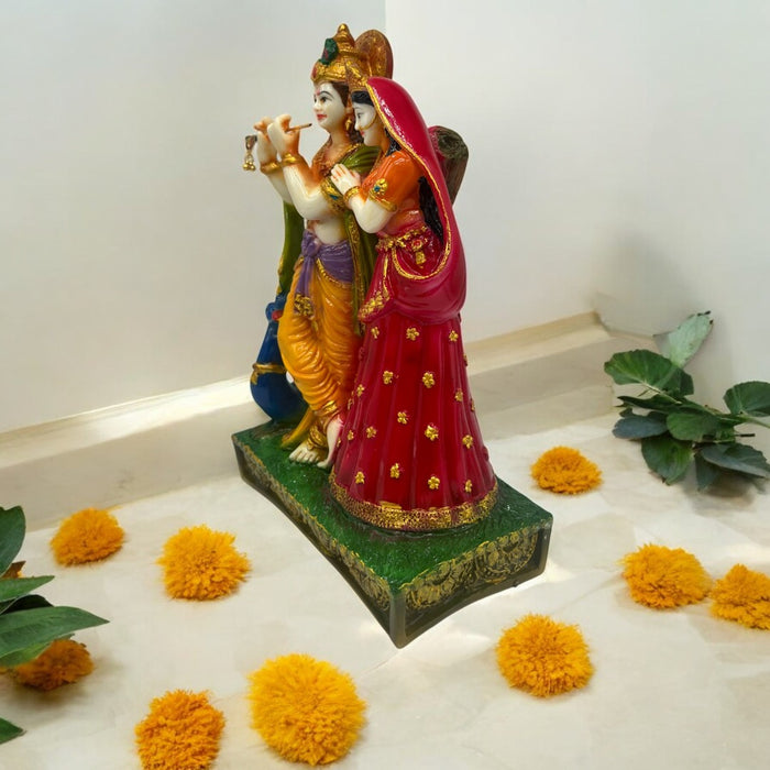Divine Radha Krishna Idol with Peacock Detailing