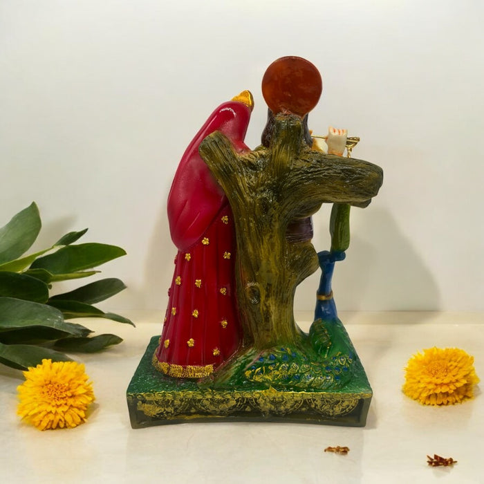 Divine Radha Krishna Idol with Peacock Detailing