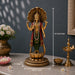 Gold-toned Hindu deity statue with a large open shell canopy, standing on a lotus base with dimension lines showing 12.5 inches high and 5.