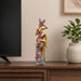 Full front view of Abstract Golden Female Resin Figurine with Floral Mask (12.3 Inch) on display base against clean studio background