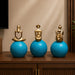 High-resolution craftsmanship detail shot displaying intricate ornamental work on Abstract Golden Women on Blue Spheres 3-Piece Resin Set (11 Inch)