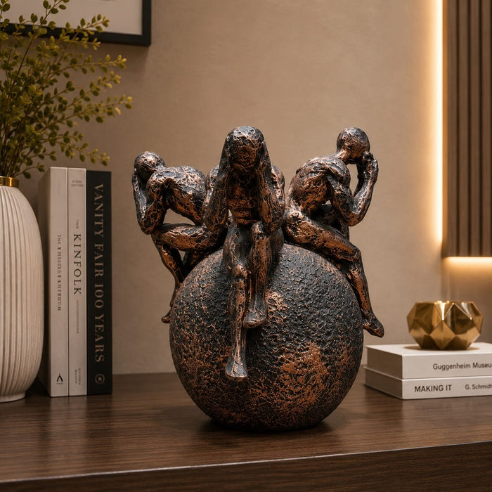 Three-quarter perspective angle view showcasing dynamic form and balanced proportions of Abstract Thinking Men on Sphere Resin Sculpture (8 Inch)