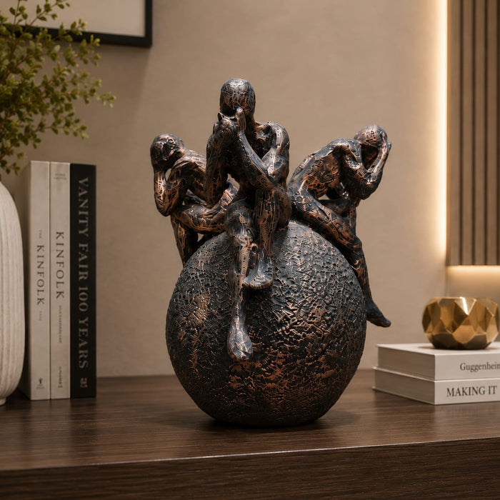 High-resolution craftsmanship detail shot displaying intricate ornamental work on Abstract Thinking Men on Sphere Resin Sculpture (8 Inch)