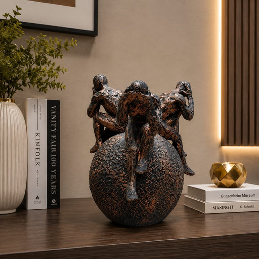 Full front view of Abstract Thinking Men on Sphere Resin Sculpture (8 Inch) on display base against clean studio background
