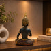 An angled perspective of the Black Meditating Buddha Idol highlighting its elegant three-dimensional form and craftsmanship.