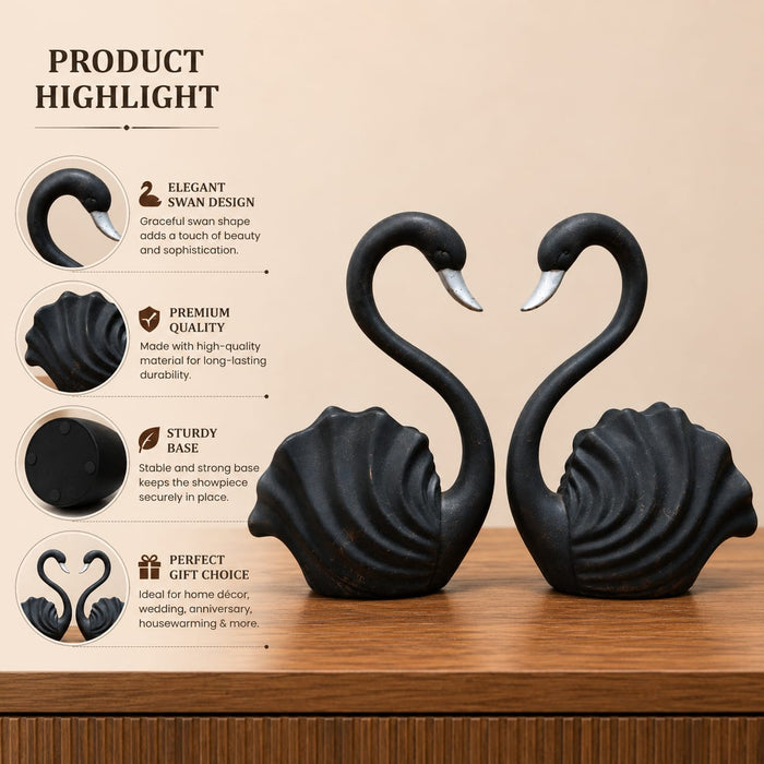 An angled perspective of the Black Swan Pair Figurine highlighting its elegant three-dimensional form and craftsmanship.