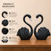 An angled perspective of the Black Swan Pair Figurine highlighting its elegant three-dimensional form and craftsmanship.