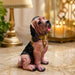 A side profile view of the Brown Sitting Beagle Figurine revealing its graceful silhouette.