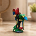 Detailed close-up of hand-painted accents, fine facial detailing, and premium Resin texture on Colorful Double Macaw Parrots on Branch Resin Sculpture (9 Inch)