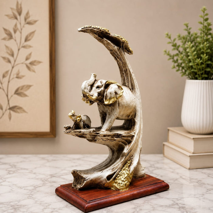 Detailed close-up of hand-painted accents, fine facial detailing, and premium Resin texture on Elephant Family on Branch Resin Sculpture (9 Inch)