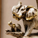 High-resolution craftsmanship detail shot displaying intricate ornamental work on Elephant Family on Branch Resin Sculpture (9 Inch)