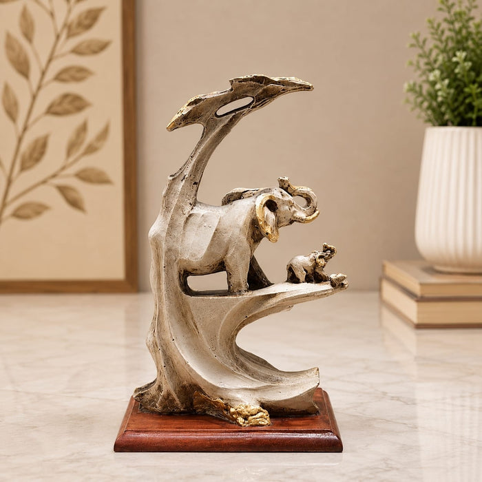 Full front view of Elephant Family on Branch Resin Sculpture (9 Inch) on display base against clean studio background