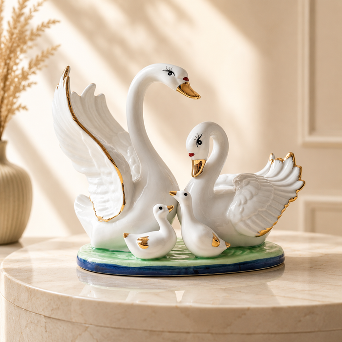White gold ceramic swan family figurine