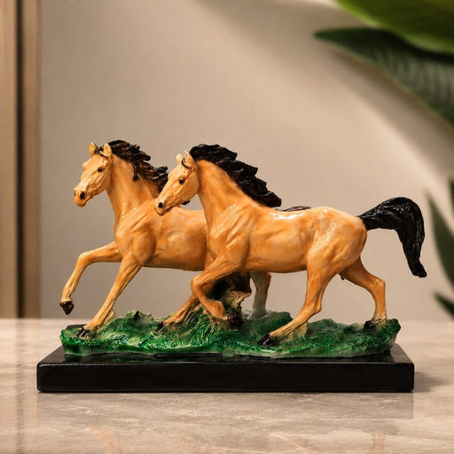 Three-quarter perspective angle view showcasing dynamic form and balanced proportions of Glossy Two Running Horses Resin Figurine on Grass Base (7.3 Inch)