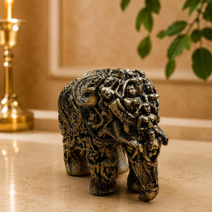 A direct front-facing view of the Gold Antique Elephant Figurine showcasing its vibrant details and premium finish.
