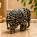 The Gold Antique Elephant Figurine beautifully styled in a modern home interior setting to inspire decor placement.