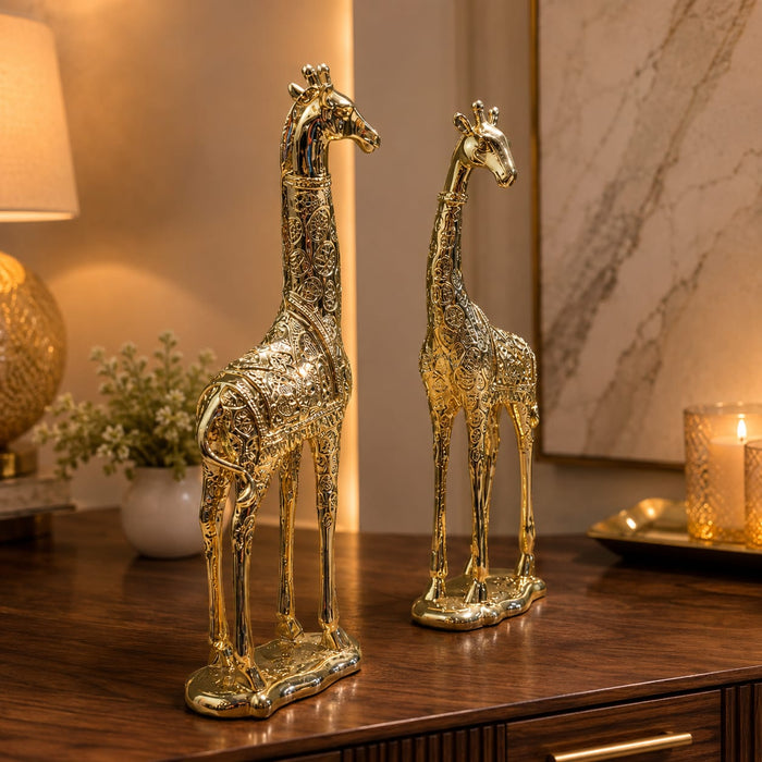 An angled perspective of the Gold Deer Pair Figurine highlighting its elegant three-dimensional form and craftsmanship.