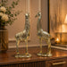 A direct front-facing view of the Gold Deer Pair Figurine showcasing its vibrant details and premium finish.