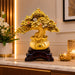 A close-up detail shot of the Gold Money Tree Showpiece focusing on the artisanal carving and rich color.