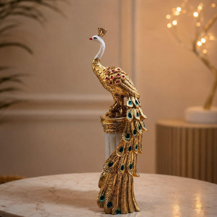 A close-up detail shot of the Gold Standing Peacock Figurine focusing on the artisanal carving and rich color.