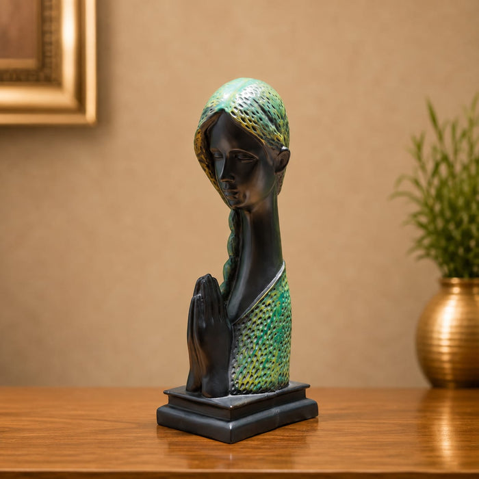 An angled perspective of the Green Abstract Face Sculpture highlighting its elegant three-dimensional form and craftsmanship.