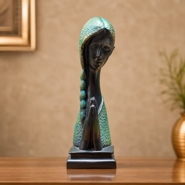 A close-up detail shot of the Green Abstract Face Sculpture focusing on the artisanal carving and rich color.