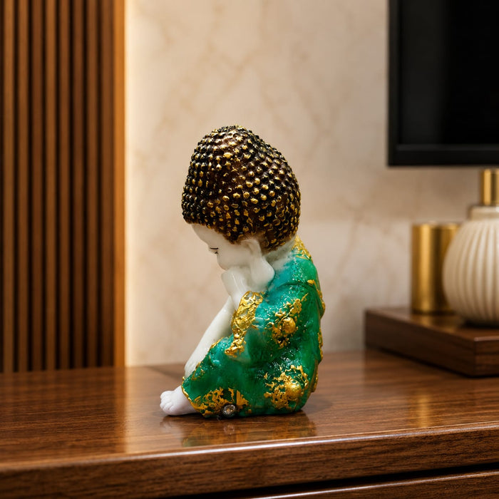 An angled perspective of the Green Little Buddha Figurine highlighting its elegant three-dimensional form and craftsmanship.