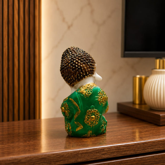 The detailed back view of the Green Little Buddha Figurine showing the intricate texture of the material.
