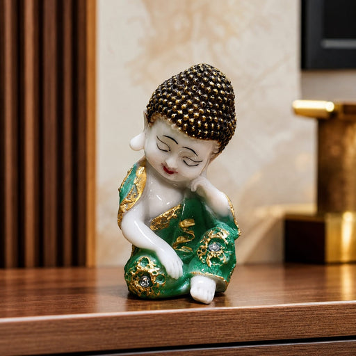 A close-up detail shot of the Green Little Buddha Figurine focusing on the artisanal carving and rich color.
