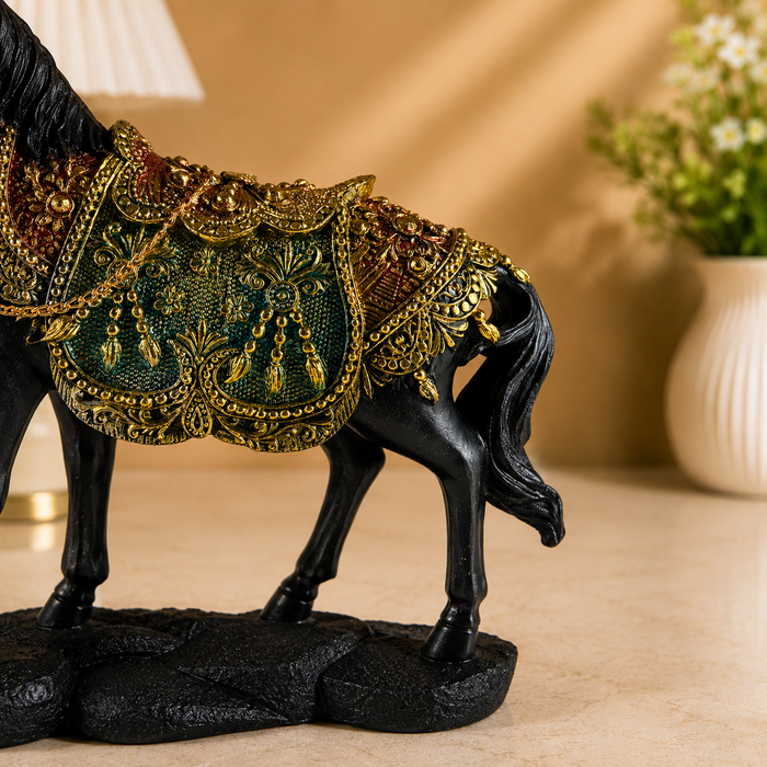 Close up of intricate traditional carvings on polyresin horse decor