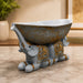 Three-quarter perspective angle view showcasing dynamic form and balanced proportions of Large Boat-Shaped Dual Elephant Resin Catchall Bowl (6.1 Inch)