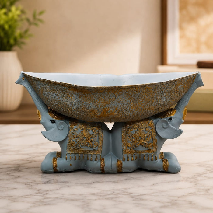Full front view of Large Boat-Shaped Dual Elephant Resin Catchall Bowl (6.1 Inch) on display base against clean studio background