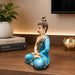 Detailed close-up of hand-painted accents, fine facial detailing, and premium Resin texture on Meditating Buddha Resin Figurine with Mirror-Work Robes (10.5 Inch)