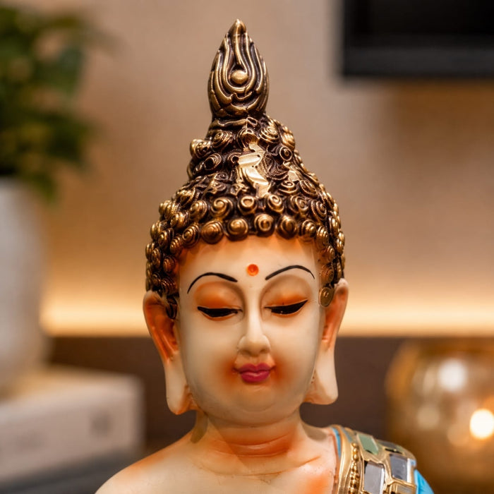 Side profile perspective showcasing elegant three-dimensional contours and sculptural depth of Meditating Buddha Resin Figurine with Mirror-Work Robes (10.5 Inch)