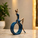 Three-quarter perspective angle view showcasing dynamic form and balanced proportions of Modern Abstract Blue Woman on Ring Resin Sculpture (11.5 Inch)