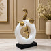 Three-quarter perspective angle view showcasing dynamic form and balanced proportions of Modern Abstract Intertwined Elephant Couple Porcelain Sculpture (13 Inch)