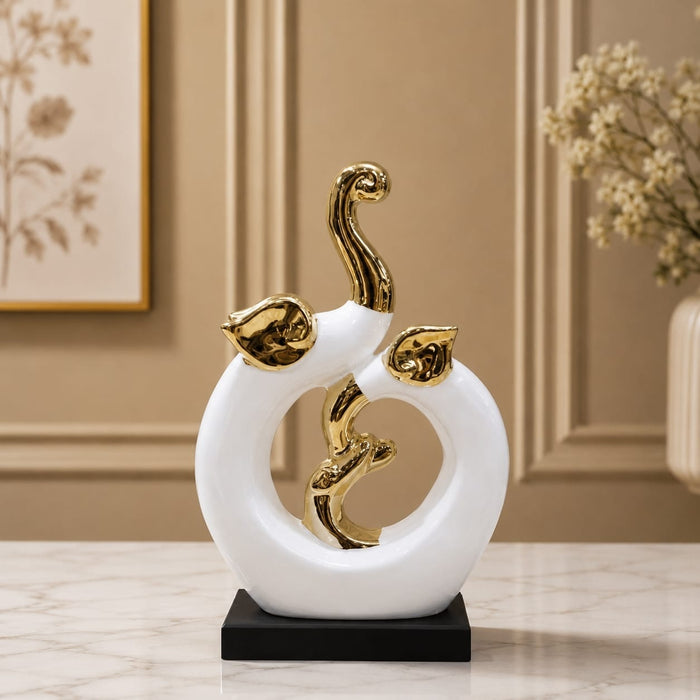 Detailed close-up of hand-painted accents, fine facial detailing, and premium Porcelain texture on Modern Abstract Intertwined Elephant Couple Porcelain Sculpture (13 Inch)