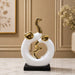 Detailed close-up of hand-painted accents, fine facial detailing, and premium Porcelain texture on Modern Abstract Intertwined Elephant Couple Porcelain Sculpture (13 Inch)