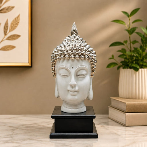 High-resolution craftsmanship detail shot displaying intricate ornamental work on Modern White and Silver Buddha Head on Black Base Resin Showpiece (11.2 Inch)