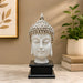 High-resolution craftsmanship detail shot displaying intricate ornamental work on Modern White and Silver Buddha Head on Black Base Resin Showpiece (11.2 Inch)