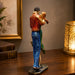 A direct front-facing view of the Multicolour Dancing Couple Figurine showcasing its vibrant details and premium finish.