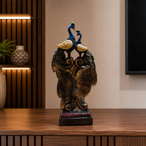 An angled perspective of the Multicolour Peacock Pair Figurine highlighting its elegant three-dimensional form and craftsmanship.