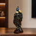 The Multicolour Peacock Pair Figurine beautifully styled in a modern home interior setting to inspire decor placement.