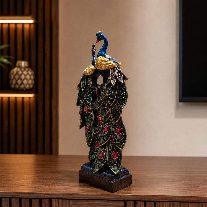 A side profile view of the Multicolour Peacock Pair Figurine revealing its graceful silhouette.