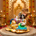 The Multicolour Radha Krishna Idol beautifully styled in a modern home interior setting to inspire decor placement.