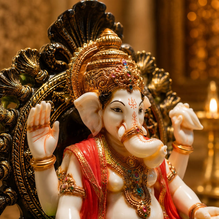 An angled perspective of the Multicolour Sitting Ganesha Idol highlighting its elegant three-dimensional form and craftsmanship.